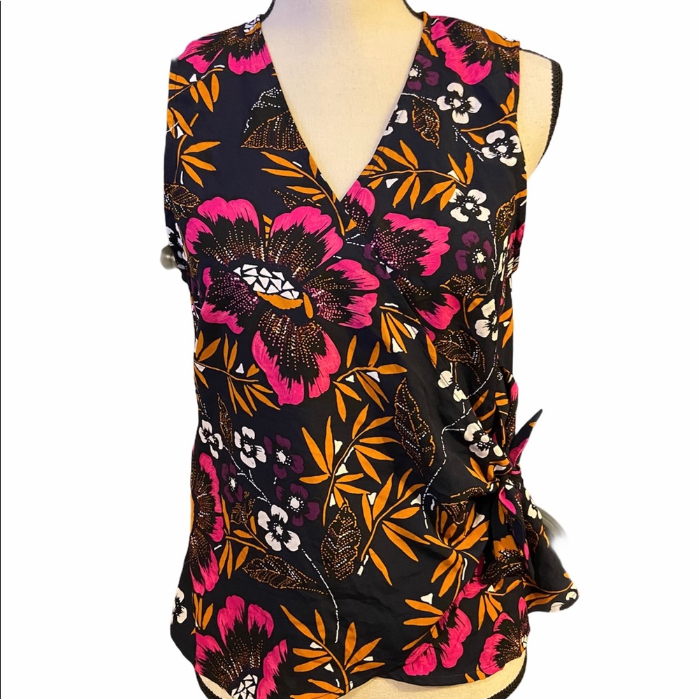 And Eawy M sleeveless floral print wrap blouse.